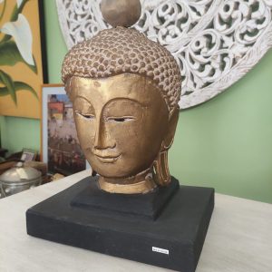 scultura testa di buddha in legno colore oro