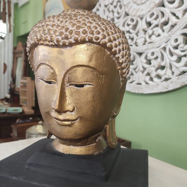 scultura testa di buddha in legno colore oro