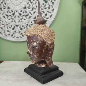 testa di buddha statua dorata