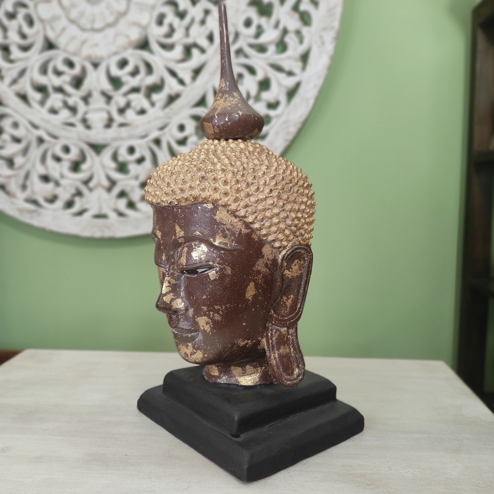 testa di buddha statua dorata