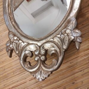 intaglio inferiore di specchio argento intagliato ovale
