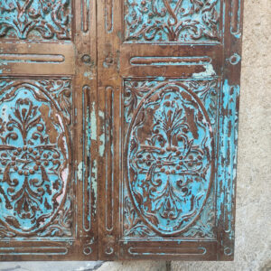 finestra indiana blu intagliata decorativa