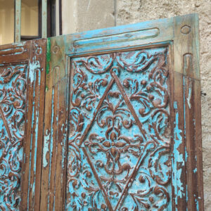 intaglio artigianale di pannello decorativo blu indiano