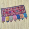 decorazione sovraporta in seta e ricami