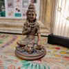 statuetta raffigurante il dio Shiva in meditazione realizzata in resina bronzata